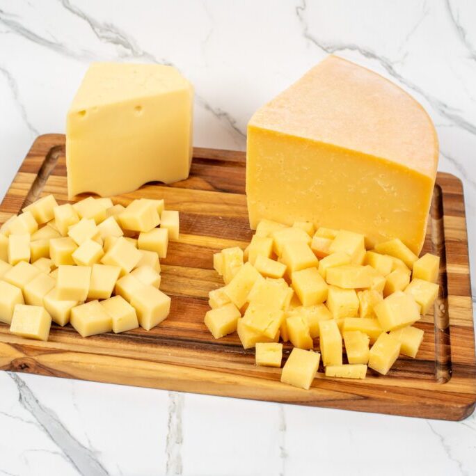cheese on cutting board