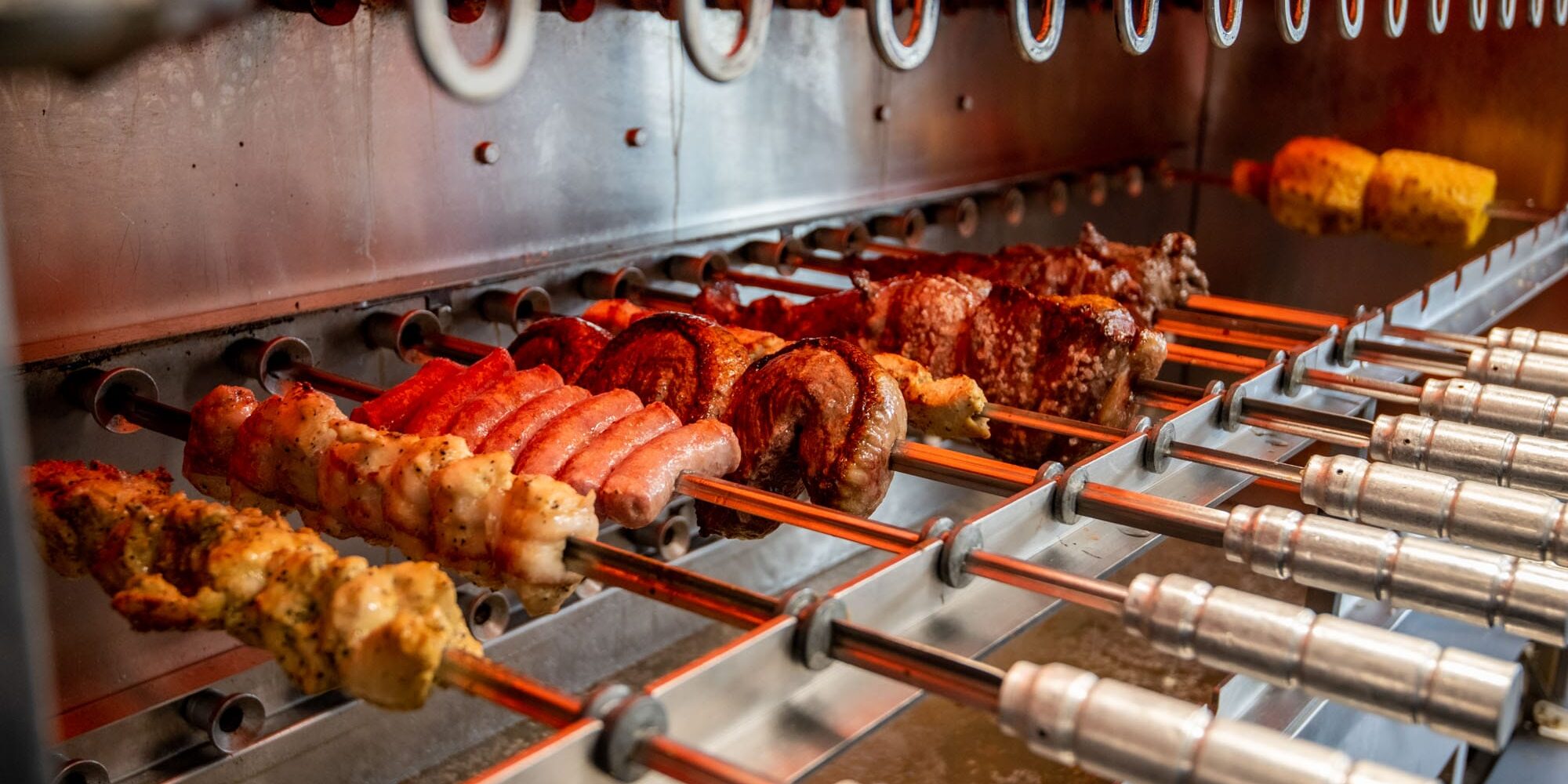 Boiada_Spokane-8398 cooking meats on skewers